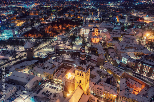 Aerial night View of Tallinn in winter with Alexander Nevsky Cathedral, roofs with snow, Christmas mood