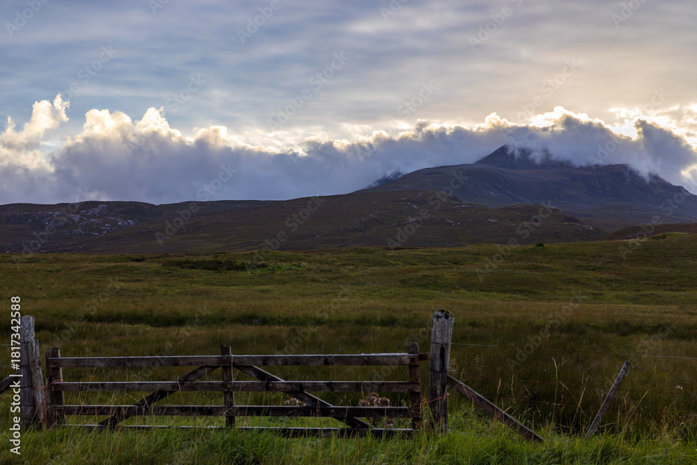 Fototapeta premium Remote Scottish moors in the most northern part of Scotland during blue hour just before sunset with pink and purple hues.