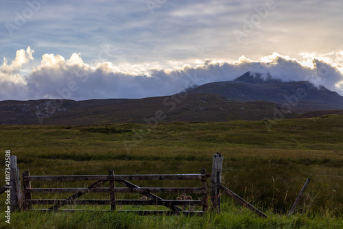 Obraz na plátně Remote Scottish moors in the most northern part of Scotland during blue hour just before sunset with pink and purple hues