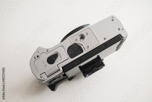 Modern digital camera with a vintage look, seen from below