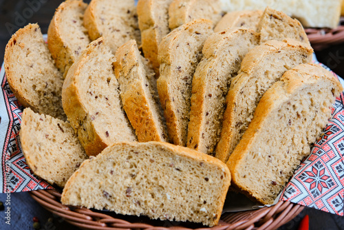 Whole Grain Healthy Sandwich Bread Square Slices, Supermarket Bread for Toasts, Soft Sandwich Loaf Pieces on wooden Background Top View, Clipping Path. wheat bread. High quality photo