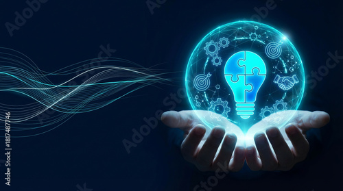 Innovation and collaboration for business solutions. Hands holding glowing lightbulb puzzle for technology strategy.