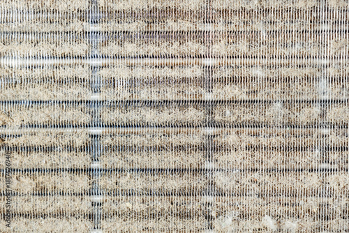 Air conditioner cooler clogged with dust, dirty refrigerator radiator