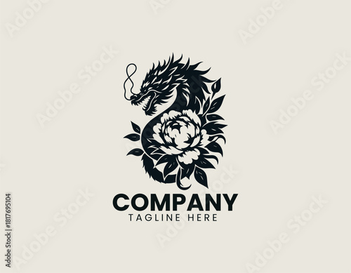 Fierce black oriental dragon icon wrapped majestically around a large blooming peony or chrysanthemum flower.