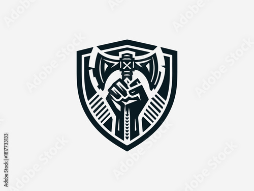 Strong hand fist gripping ax black vector logo with heraldic crest details for power brand identity