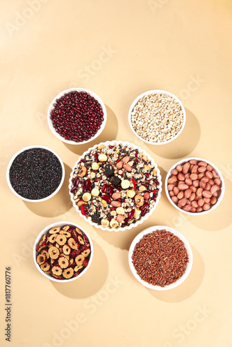 Variety of healthy cereals grains rice and legumes in bowls for nutritious breakfast and diet