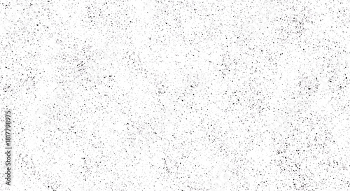 White background with scattered black speckles and dots pattern