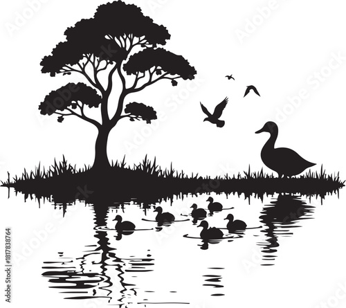 Black silhouette of ducks and birds by a tree reflected in water