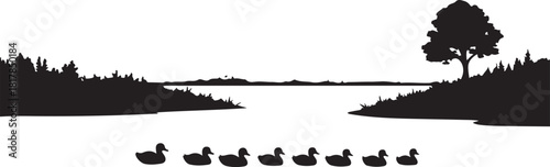 Black silhouette of ducks swimming on a lake with trees and hills