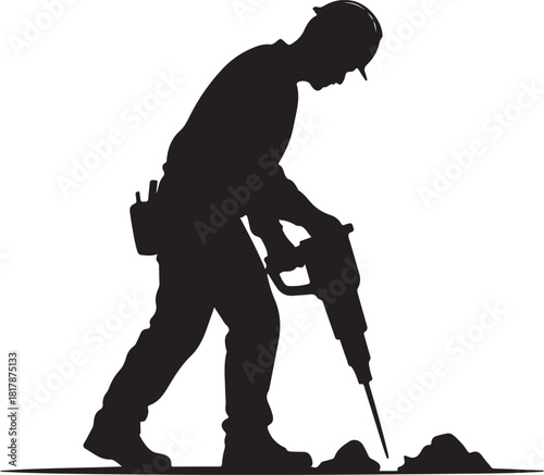 Silhouette of a construction worker operating a jackhammer on a worksite