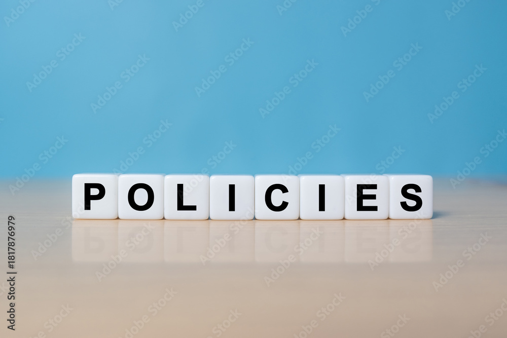 Fototapeta premium Word POLICIES made with dice building blocks