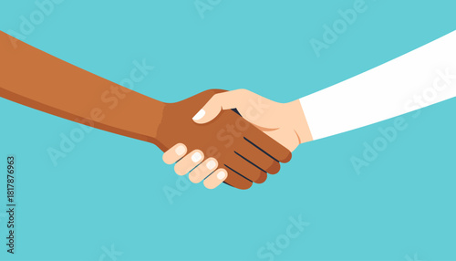 Diverse handshake on blue background symbolizing agreement and partnership.