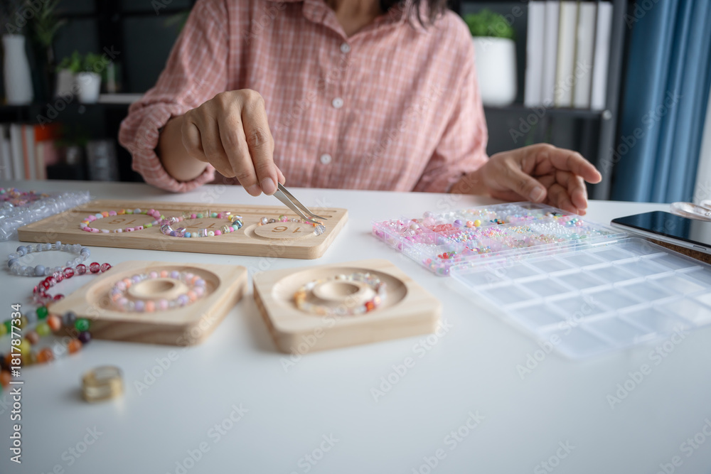Obraz premium Senior mature older asian woman Art hobby handmade making beads jewellery accessories handcraft hobby
