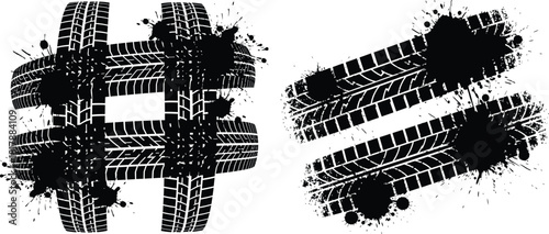 Grungy tire prints arranged into a social media hashtag sign, with additional vehicle tracks and ink blots