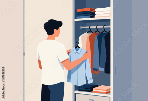 A person in a white shirt and dark pants selecting a light blue shirt from a closet. Other clothes are hanging