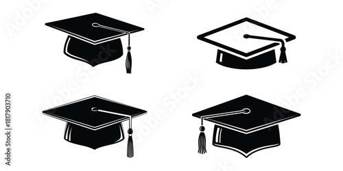 Four black graduation caps with tassels, isolated on