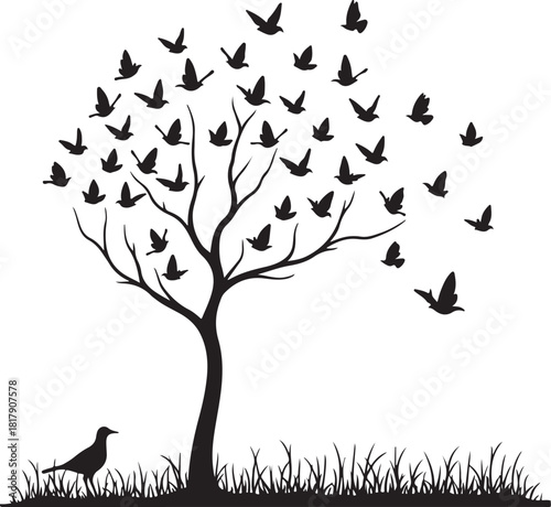 Black silhouette tree with flock of birds flying away