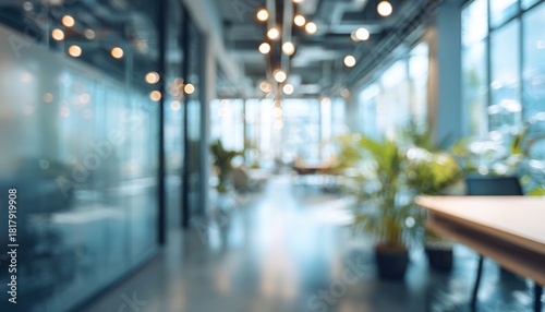 Abstract office interior background. Blurry office space. Modern workspace design. Glass walls, blurred furniture, plants. Natural light, commercial building, business concept, indoor. High quality