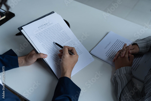 Lawyer give suggestions to client and signing contact