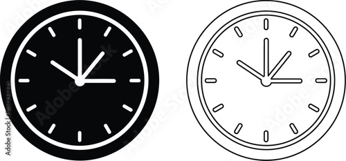 Two analog clocks one dark and one light showing similar times