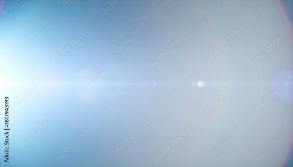 Obraz premium Bright Anamorphic Lens Flare Effect Overlay on Blue Background