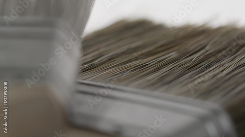 High Quality Video of close-up on Farrow and Ball paintbrush bristles and handle. Detailed view of bristle texture and craftsmanship, ideal for precision painting tasks.