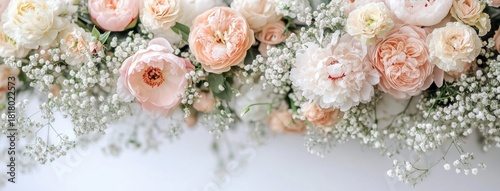 Beautiful Floral Arrangement Featuring Roses and Babys Breath in Soft Pastel ...