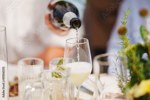 Sparkling drink being poured at a festive gathering