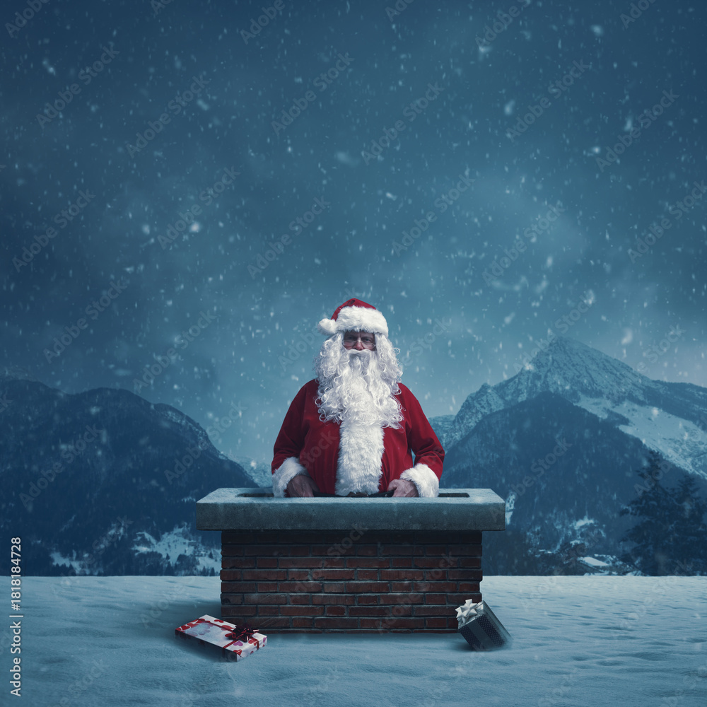 Obraz premium Funny Santa Claus stuck in a chimney