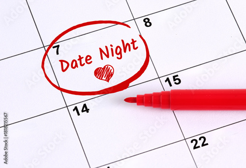 Red Marker Circling Date Night on Calendar with Heart Shape