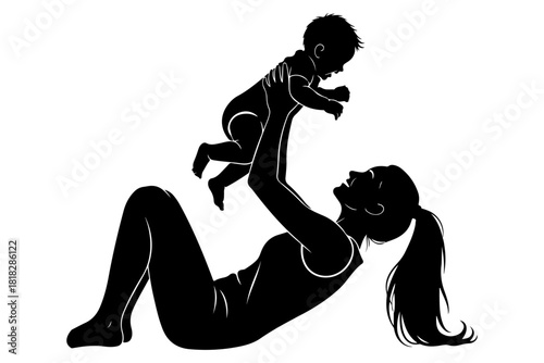 Silhouette of a Mother Playing and Lifting Her Baby in a Moment of Joy and Love