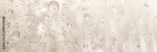 Water droplets on backlit g...