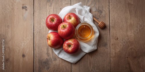 Apples and honey arranged o...