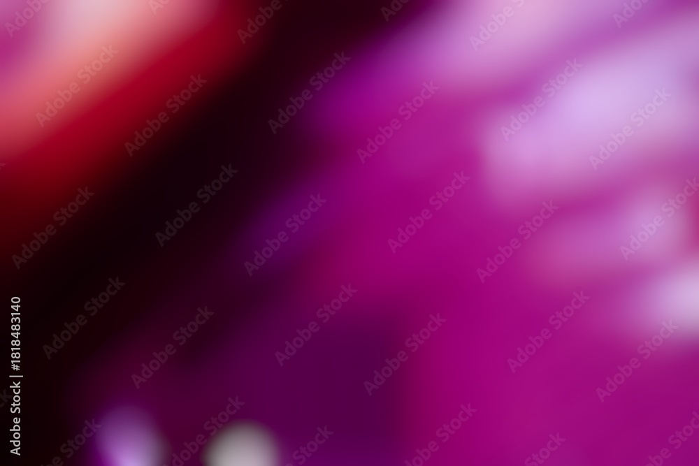 Fototapeta premium Abstract crimson and violet light streaks create a vivid ethereal background effect