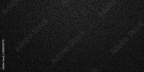 Black sponge with a seamless texture used as a background for text or layout design