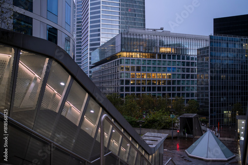Architecture skyscrapers skyline night corporate finance urban modern in la defense paris france presenting a cohesive business focused urban image for commercial use