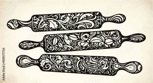 Ornate rolling pins adorned with intricate floral patterns, evoking vintage baking and craftsmanship.