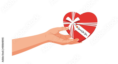 Hand offering a red heart shaped gift box with a white ribbon and a special for you tag