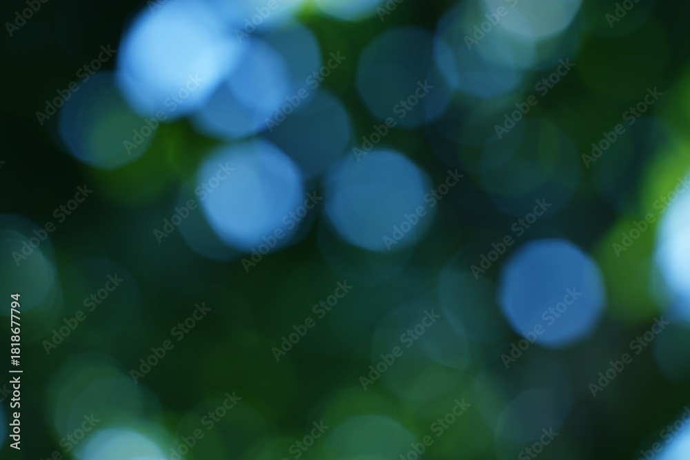 Obraz premium Abstract bokeh lights evoke a sense of peacefulness and serenity in nature settings