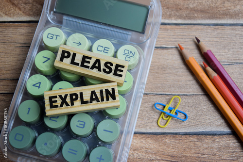 Please explain text stacked wooden cubes on the table.