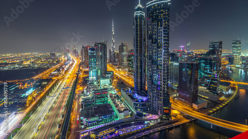 Evening skyline with modern skyscrapers and traffic on sheikh zayed road day ...