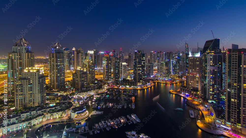 Fototapeta premium Dubai marina harbor panorama from night to day transition timelapse