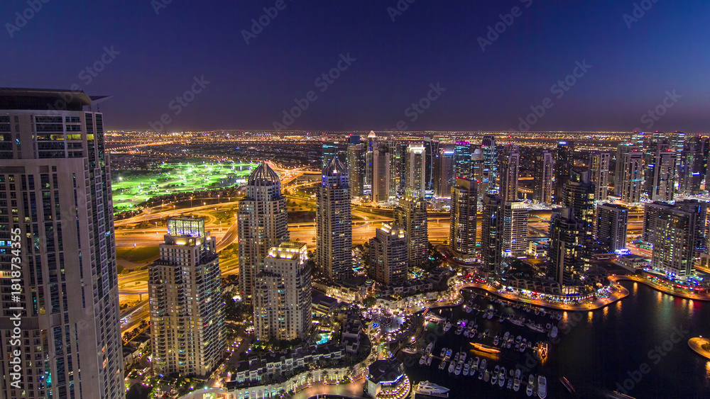 Fototapeta premium Dubai Marina with yachts day to night aerial timelapse