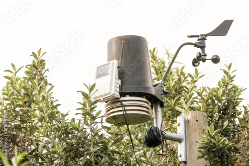 weather station outdoors and close up used to monitor weather and forecast climate conditions such as wind, temperature and humidity concept technology and equipment