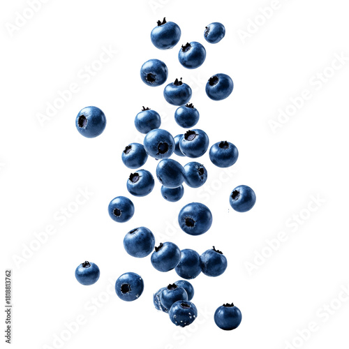 A group of blueberries floating in the air .