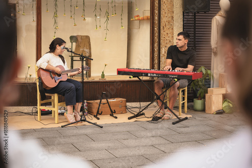 Street musicians performing live in an outdoor setting