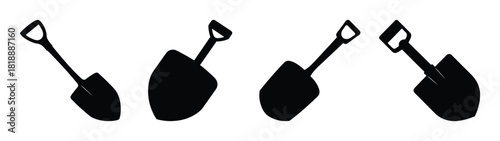 Four black shovels arranged in a row with different angles