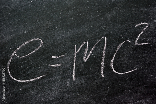 E=mc2 equation for Albert Einsteins theory of relativity written on a blackboard