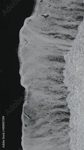 Aerial Waves on Black Sand Coastline