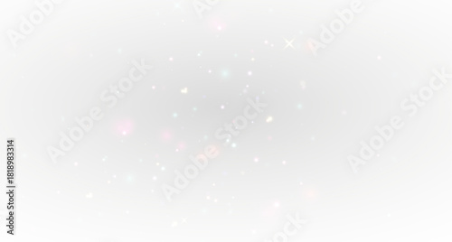 Bright sparkling stardust glow with dazzling isolated particles for luxury celebration light textures.